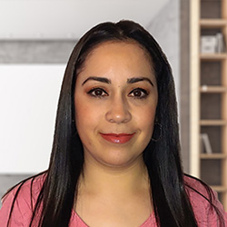 Violeta Varela portrait, smiling at camera.
